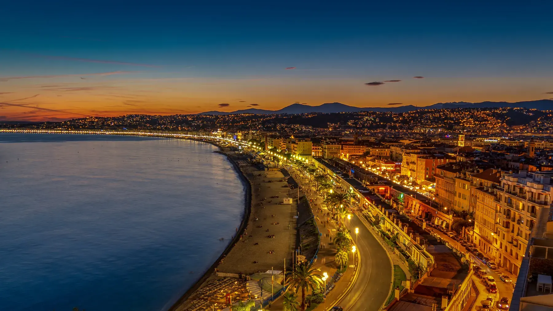 The Baie des Anges and the Promenade des Anglais at dusk